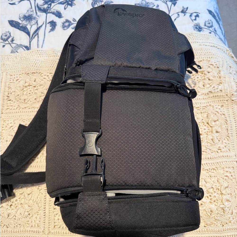 Lowepro camera backpack with laptop sleeve.